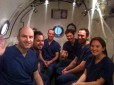 Picture of group inside a decompression chamber