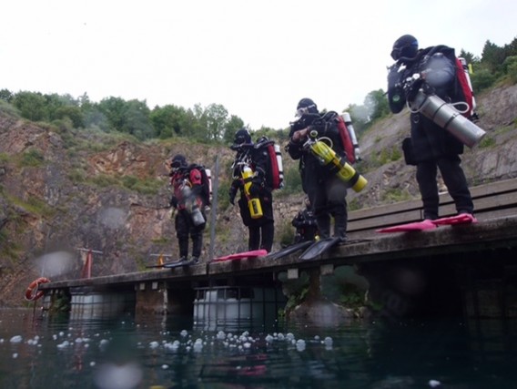 Four Hollis Prism 2 divers ready to go